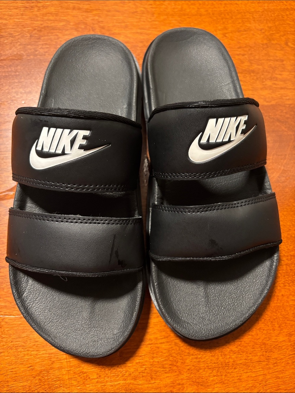 Nike Black Slides with White Swoosh Double Straps
